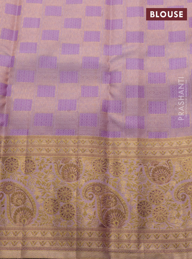 Pure kanchipuram silk saree pastel pink and purple with allover zari woven brocade weaves and zari woven mina border