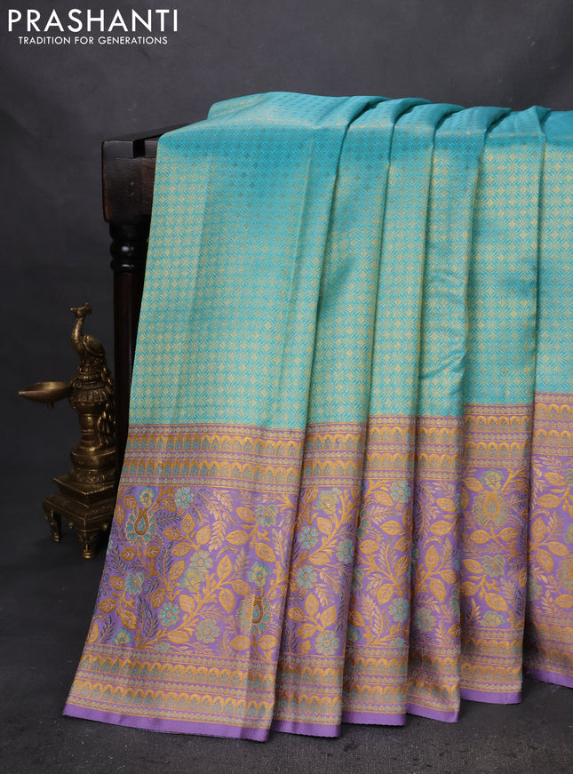 Pure kanchipuram silk saree teal blue and lavender with allover zari woven brocade weaves and zari woven mina border
