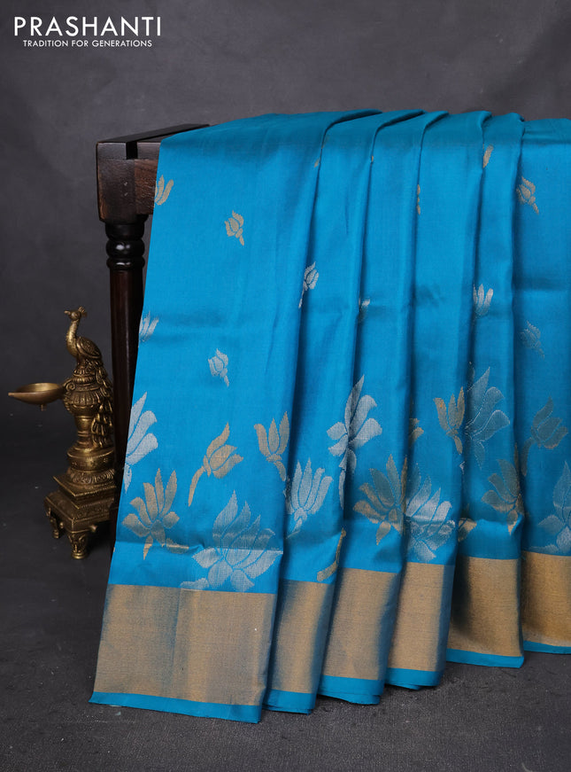 Pure uppada silk saree teal blue with allover silver & gold zari woven floral buttas and zari woven border
