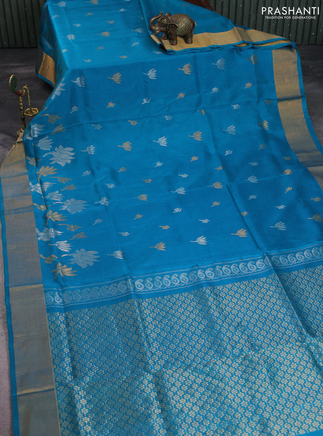Pure uppada silk saree teal blue with allover silver & gold zari woven floral buttas and zari woven border