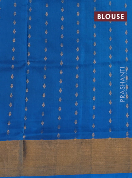 Pure uppada silk saree dual shade of green and cs blue with allover zari woven buttas and zari woven border