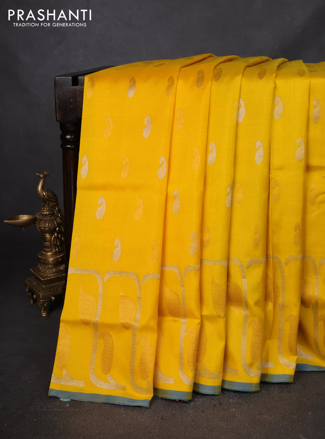 Pure uppada silk saree yellow and cs blue with silver & gold zari woven buttas and rich zari border