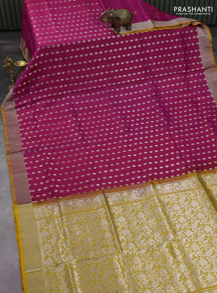 Pure uppada silk saree magenta pink and mustard yellow with allover silver zari woven butta weaves and silver zari woven border