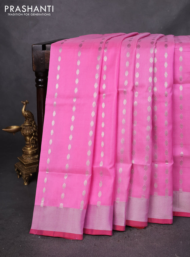 Pure uppada silk saree light pink and maroon with allover silver zari woven butta weaves and silver zari woven border