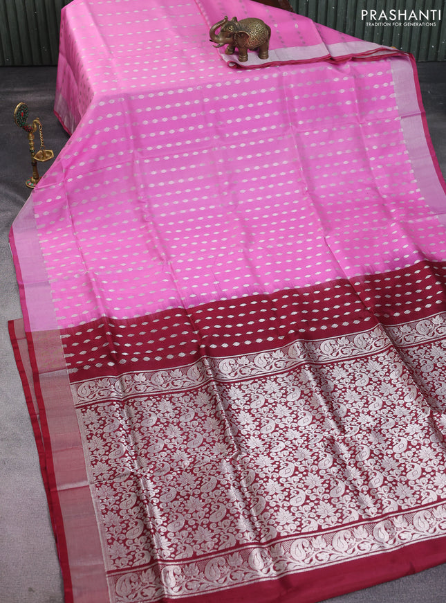 Pure uppada silk saree light pink and maroon with allover silver zari woven butta weaves and silver zari woven border
