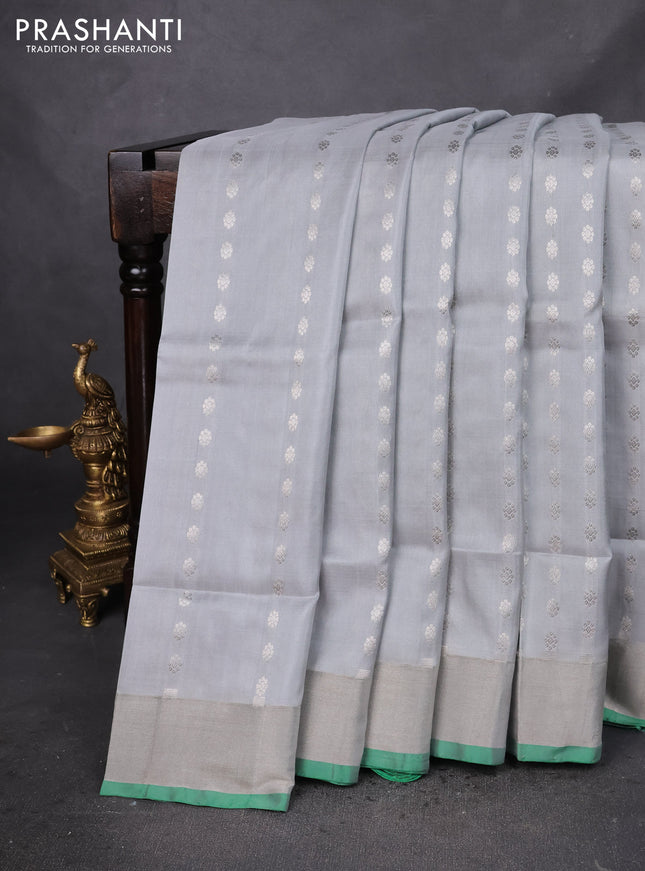 Pure uppada silk saree pastel grey and green with allover silver zari woven butta weaves and silver zari woven border