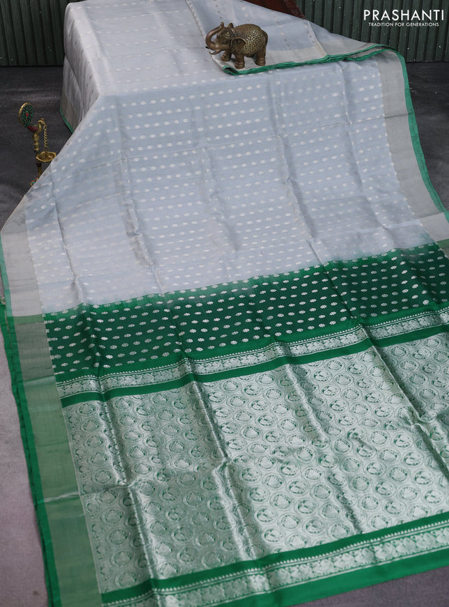 Pure uppada silk saree pastel grey and green with allover silver zari woven butta weaves and silver zari woven border