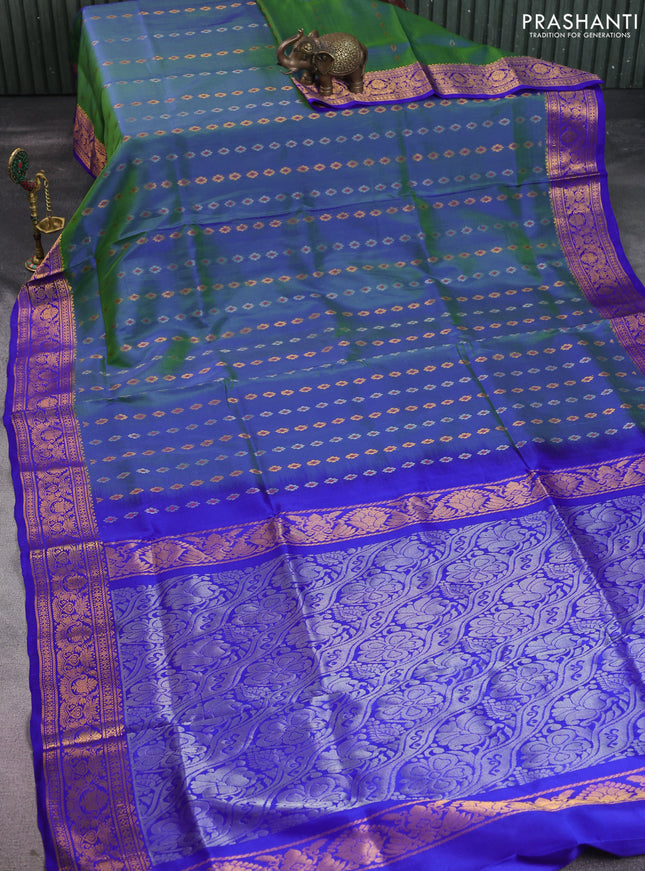 Pure uppada silk saree dual shade of bluish green and blue with silver & gold zari woven buttas and zari woven border