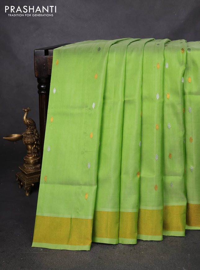 Pure uppada silk saree light green with silver & gold zari woven buttas and zari woven border
