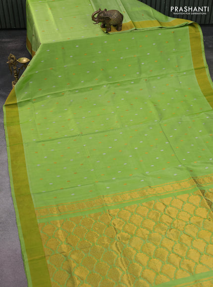 Pure uppada silk saree light green with silver & gold zari woven buttas and zari woven border