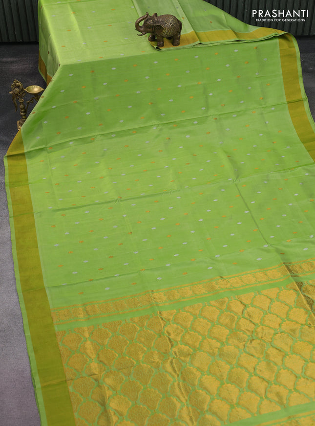 Pure uppada silk saree light green with silver & gold zari woven buttas and zari woven border