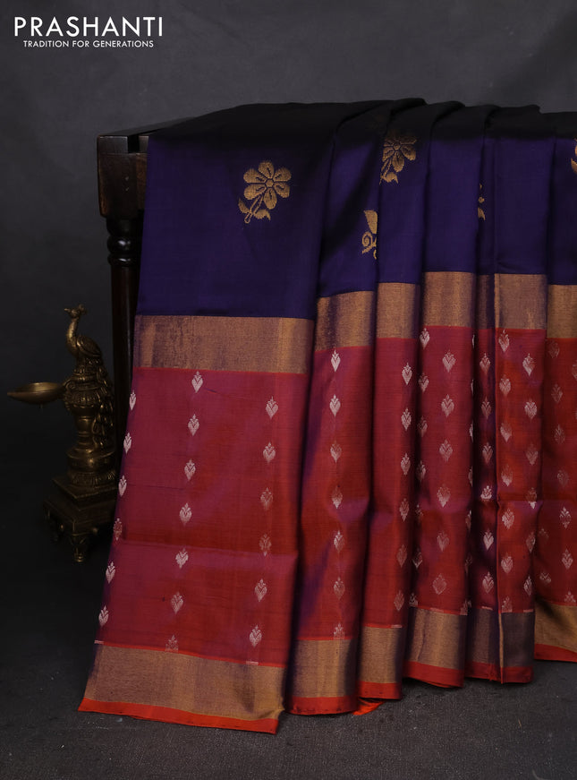 Pure uppada silk saree dark blue and dual shade of rustic orange with zari woven buttas and long zari woven butta border