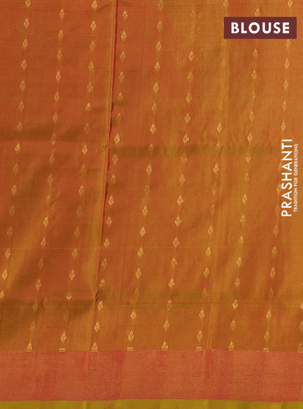 Pure uppada silk saree dark blue and dual shade of rustic orange with zari woven buttas and long zari woven butta border