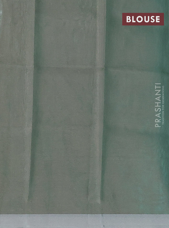 Pure uppada silk saree teal green shade with silver zari woven buttas and silver zari woven border