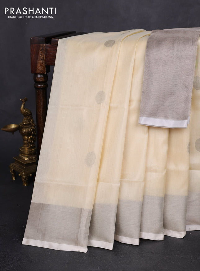 Pure uppada silk saree cream with silver zari woven buttas and silver zari woven border