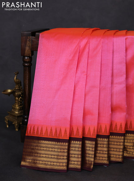 Silk cotton saree candy pink and wine shade with plain body and temple design zari woven korvai border
