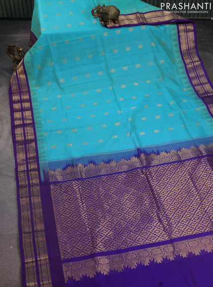 Silk cotton saree teal blue and violet with rudhraksha & annam zari woven buttas and temple design zari woven korvai border