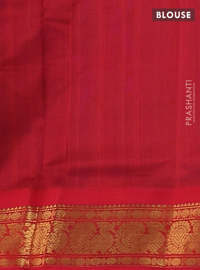 Silk cotton saree dual shade of bluish green and red with plain body and annam zari woven korvai border