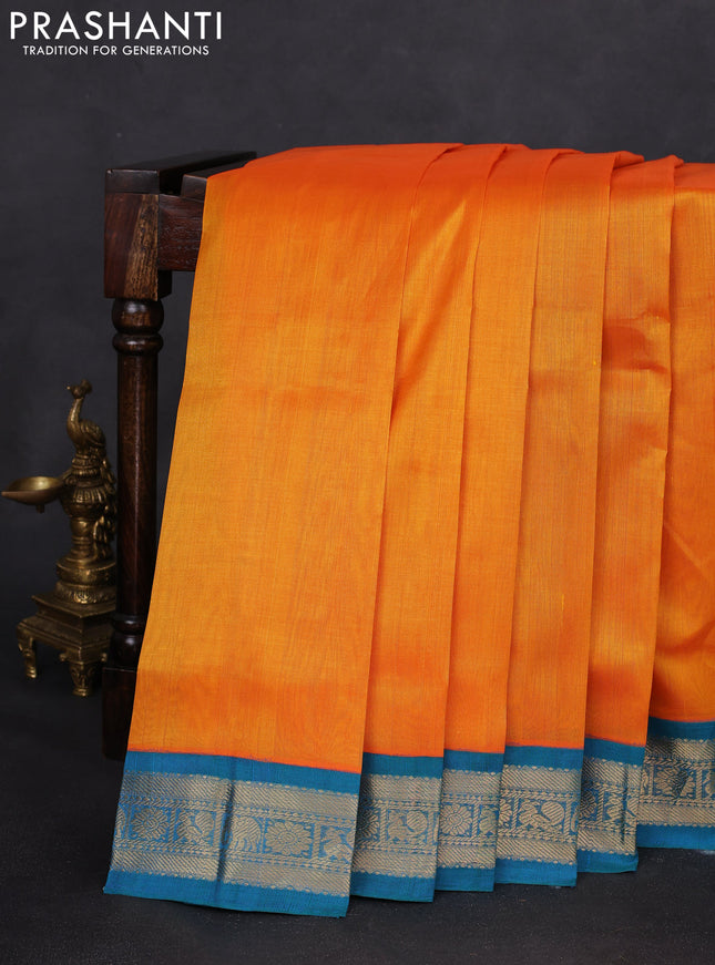 Silk cotton saree mango yellow and dual shade of teal blue with plain body and zari woven korvai border