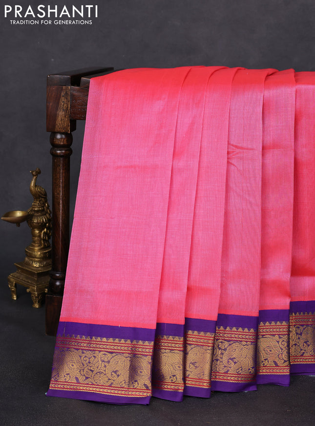 Silk cotton saree candy pink and blue with plain body and elephant zari woven korvai border