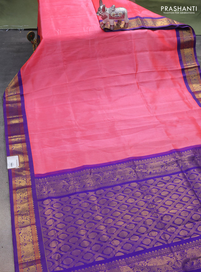 Silk cotton saree candy pink and blue with plain body and elephant zari woven korvai border