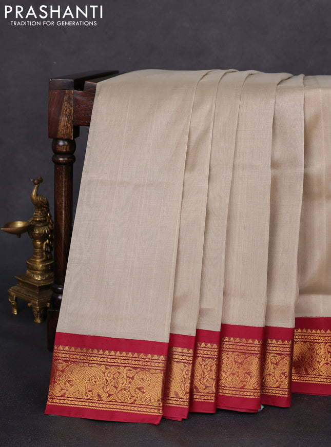 Silk cotton saree pastel grey and maroon with plain body and elephant zari woven korvai border