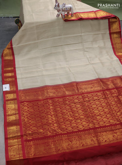 Silk cotton saree pastel grey and maroon with plain body and elephant zari woven korvai border