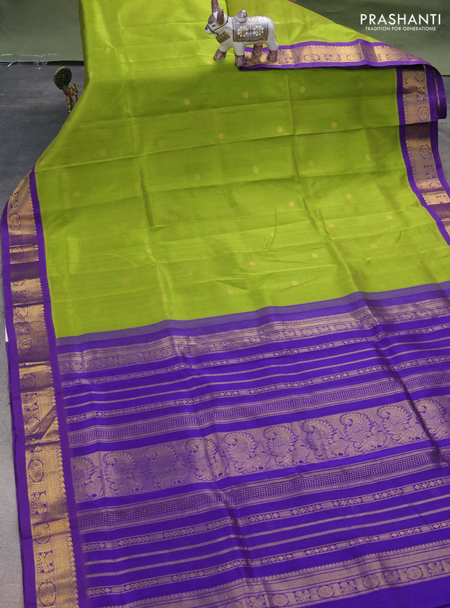 Silk cotton saree green and violet with rudhraksha zari woven buttas and zari woven korvai border