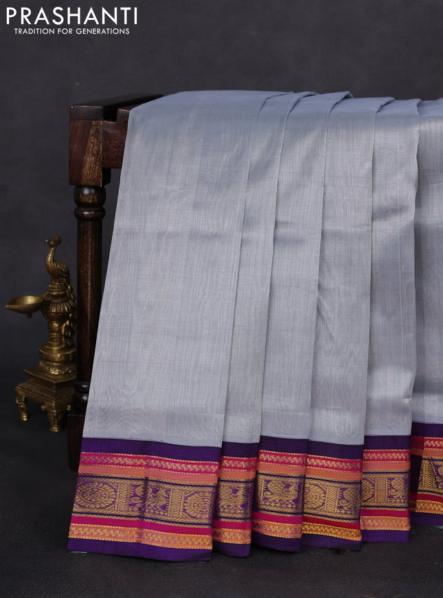 Silk cotton saree grey and violet with plain body and zari woven korvai border
