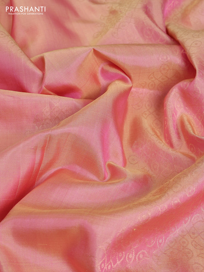 Pure soft silk saree dual shade of peach with zari woven buttas and embroidery border