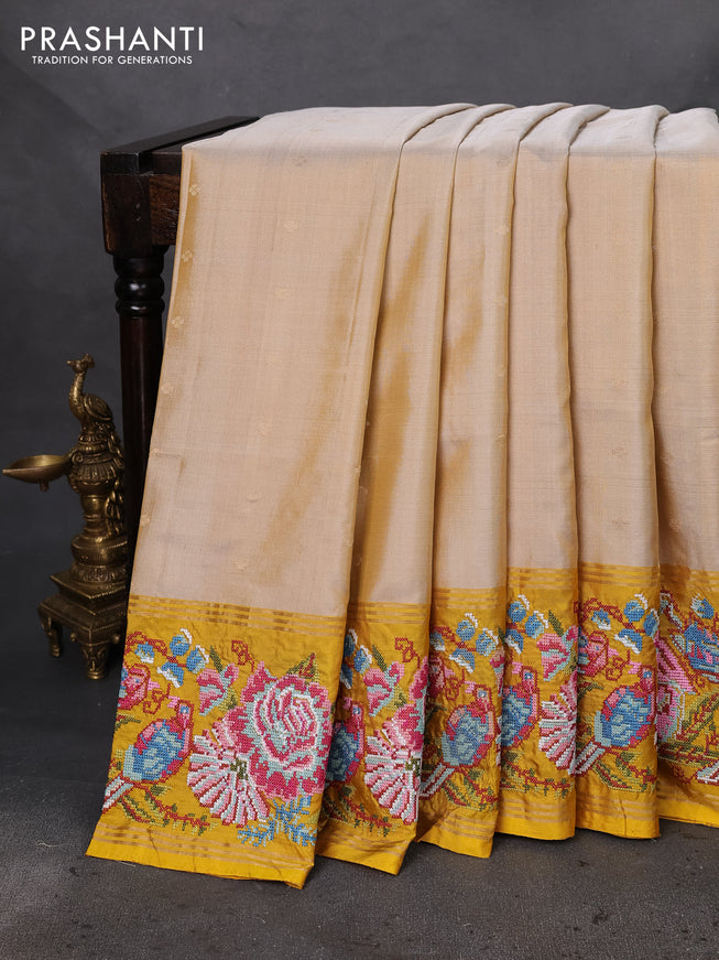 Pure soft silk saree beige and yellow with zari woven buttas and embroidery border