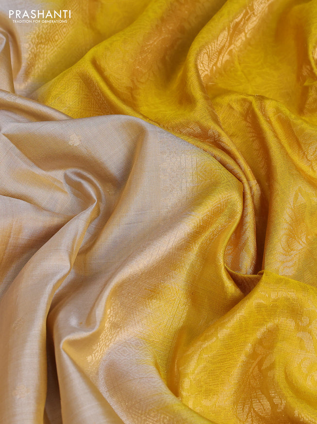 Pure soft silk saree beige and yellow with zari woven buttas and embroidery border