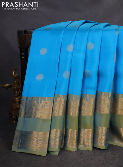 Kanchipuram silk saree cs blue and green shade with zari woven buttas and long zari woven border