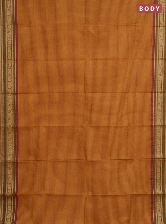 Chettinad cotton saree dark mustard and sap green with allover thread checked pattern and thread woven border