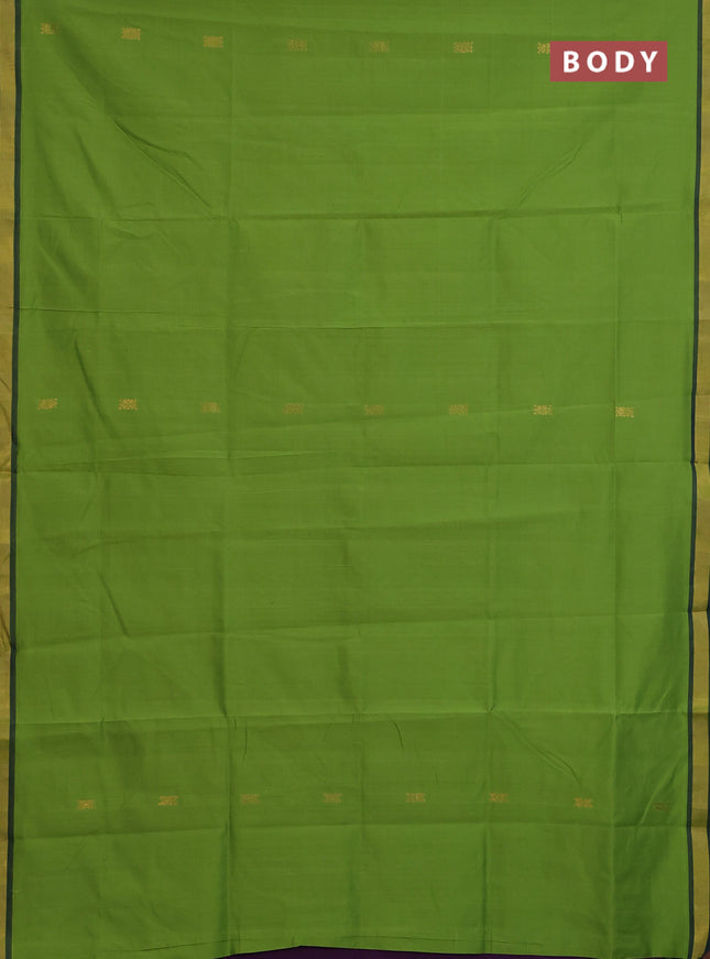 Semi silk cotton saree deep purple and light green with zari woven buttas and zari woven border