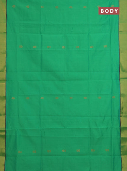 Semi silk cotton saree green and purple with zari woven buttas and zari woven border