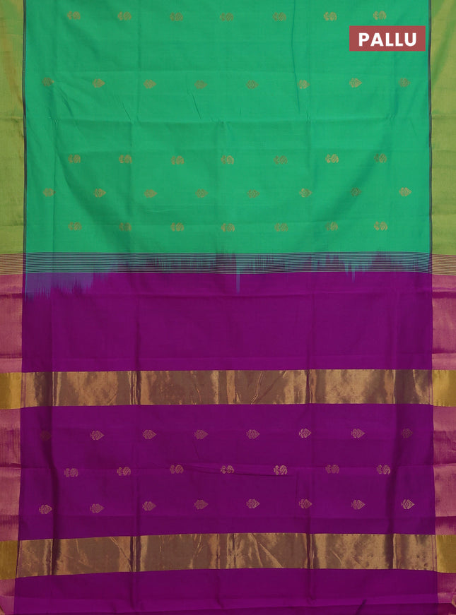 Semi silk cotton saree green and purple with zari woven buttas and zari woven border