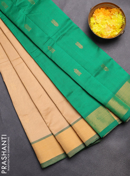 Semi silk cotton saree sandal and green with zari woven buttas and zari woven border