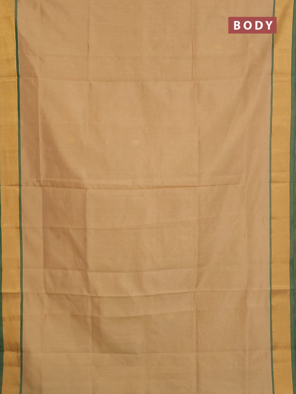 Semi silk cotton saree sandal and green with zari woven buttas and zari woven border