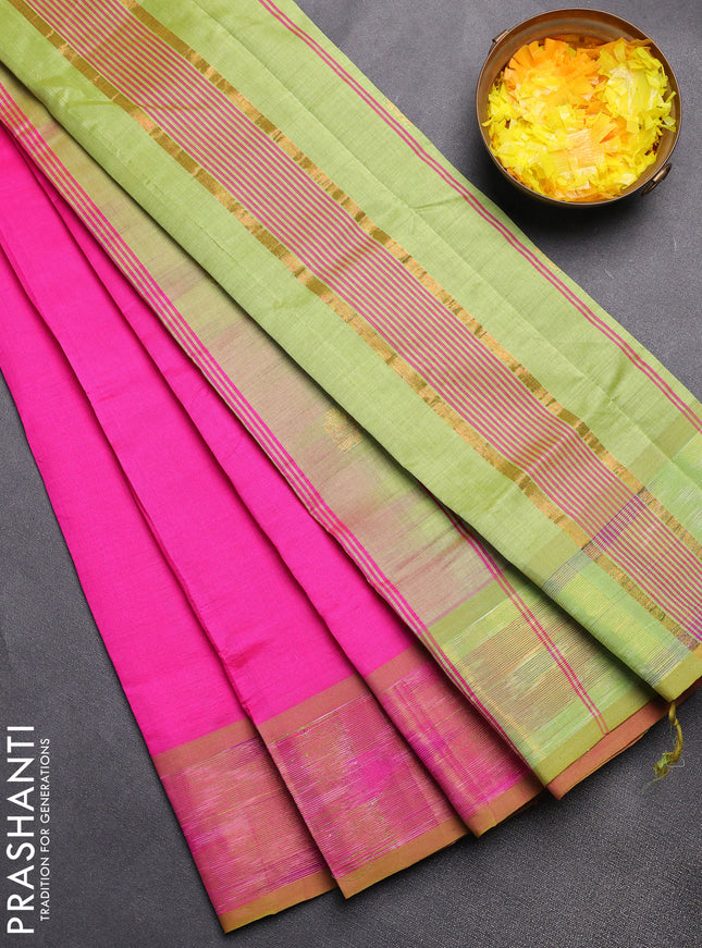 Semi silk cotton saree pink and light green with zari woven buttas and zari woven ikat style border