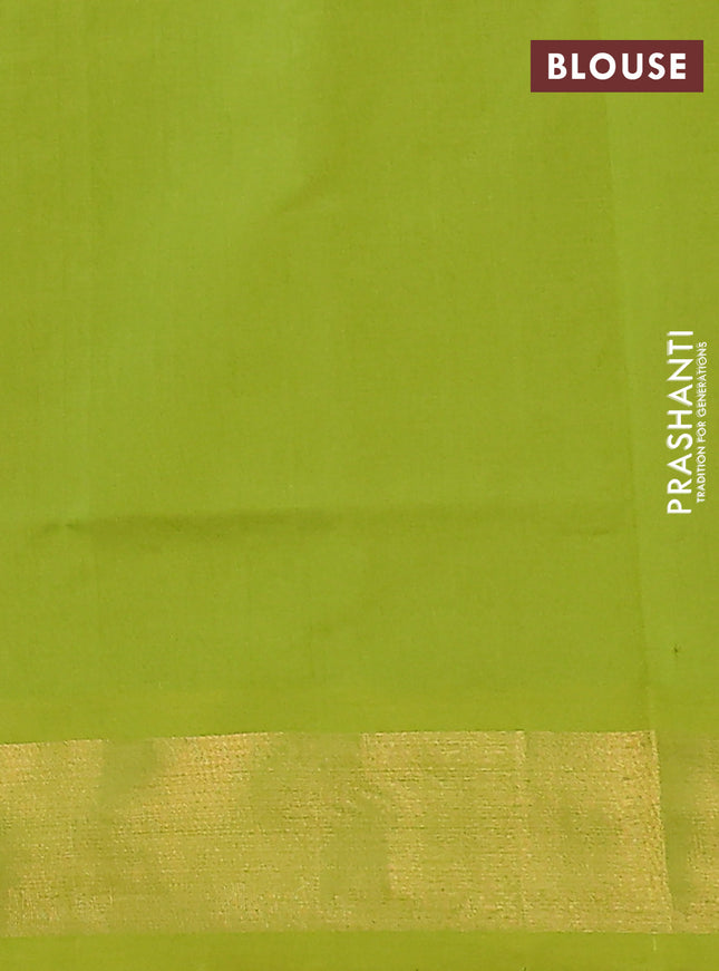 Semi silk cotton saree purple and light green with zari woven buttas and zari woven border