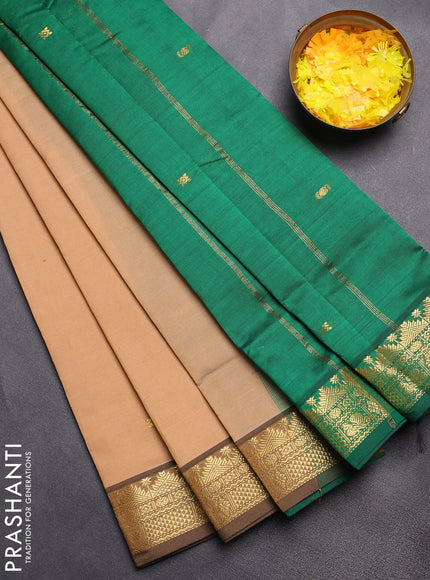 Semi silk cotton saree sandal and green with zari woven buttas and zari woven border