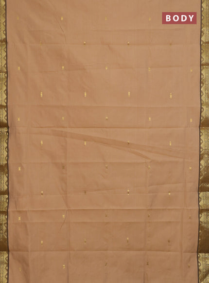 Semi silk cotton saree sandal and green with zari woven buttas and zari woven border