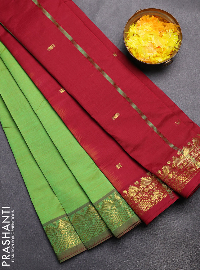 Semi silk cotton saree dual shade of green and maroon with zari woven buttas and zari woven border