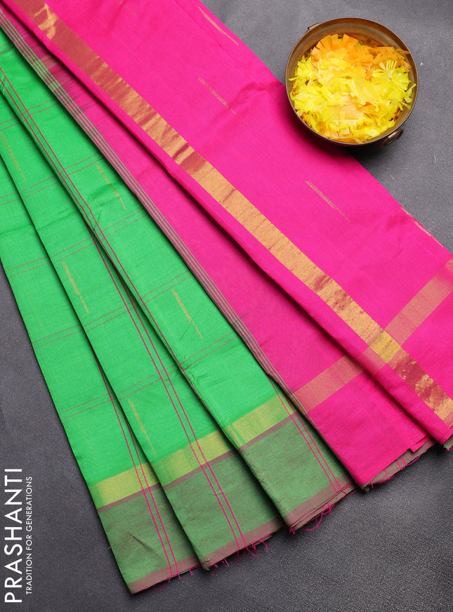 Semi silk cotton saree parrot green and pink with allover checks & buttas and zari woven simple border