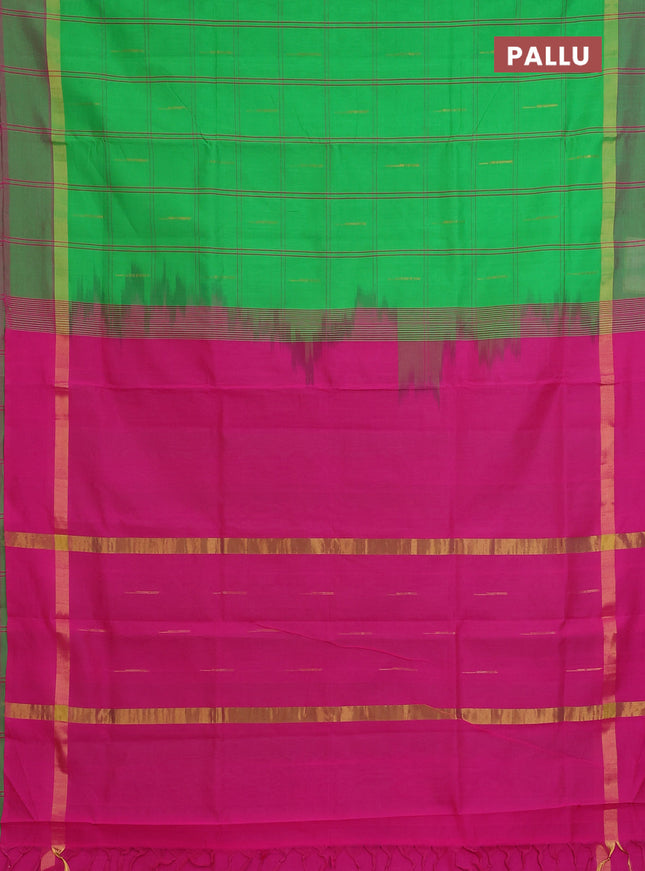 Semi silk cotton saree parrot green and pink with allover checks & buttas and zari woven simple border