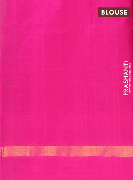 Semi silk cotton saree parrot green and pink with allover checks & buttas and zari woven simple border