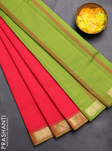 Semi silk cotton saree red and light green with plain body and zari woven border