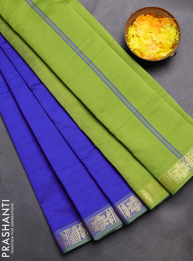 Semi silk cotton saree blue and light green with plain body and zari woven border