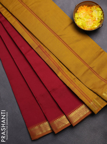 Semi silk cotton saree maroon and mustard yellow with plain body and zari woven border